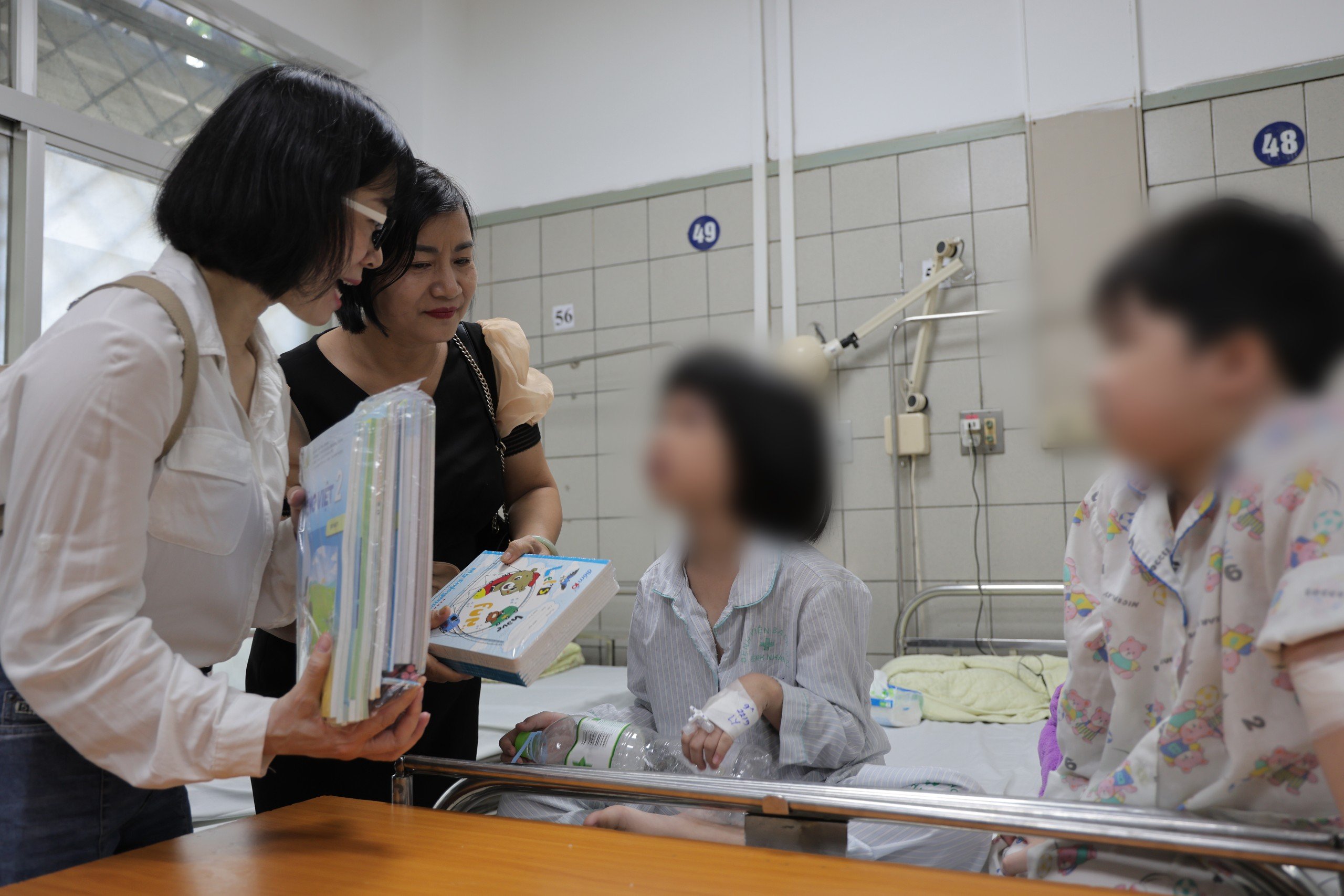 Nhà xuất bản Giáo dục Việt Nam chia sẻ khó khăn với các nạn nhân trong vụ hoả hoạn chung cư mini Khương Hạ